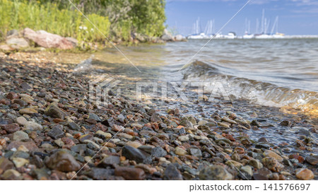 Rocky Lakeshore with Gentle Rolling Waves Rocky Lakeshore with Gentle Rolling Waves 141576697