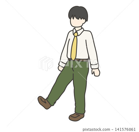 A boy walking in a blazer uniform with green trousers. A boy walking in a blazer uniform with green trousers. 141576861
