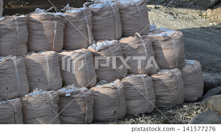 Flood control construction image (flood damage, heavy rain disaster, recovery, flood control construction, river construction, embankment construction) Flood control construction image (flood damage, heavy rain disaster, recovery, flood control construction, river construction, embankment construction) 141577276