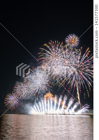 Large, spectacular fireworks light up the night sky at the Gamagori Fireworks Festival. Large, spectacular fireworks light up the night sky at the Gamagori Fireworks Festival. 141577300