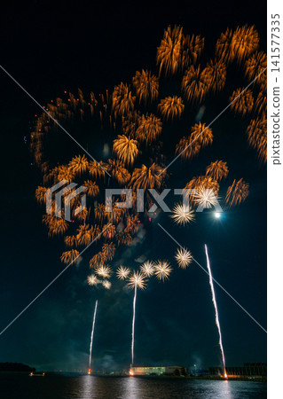 Large, spectacular fireworks light up the night sky at the Gamagori Fireworks Festival. Large, spectacular fireworks light up the night sky at the Gamagori Fireworks Festival. 141577335