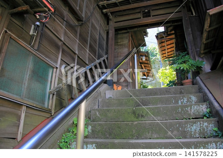 A charming alleyway staircase in front of the former residence of Higuchi Ichiyo A charming alleyway staircase in front of the former residence of Higuchi Ichiyo 141578225