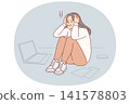 Upset cold woman suffering from stress or burnout, sitting on floor near papers and laptop 141578803