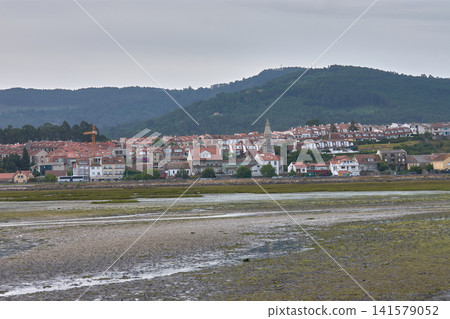 Traditional houses and church tower in Sabaris, Baiona Traditional houses and church tower in Sabaris, Baiona 141579052