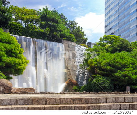Artificial waterfalls and greenery flowing through Makuhari Sub-City Artificial waterfalls and greenery flowing through Makuhari Sub-City 141580334