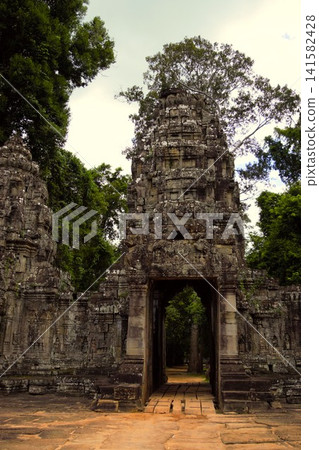 Entrance to Preah Khan, part of the Angkor archaeological complex Entrance to Preah Khan, part of the Angkor archaeological complex 141582428