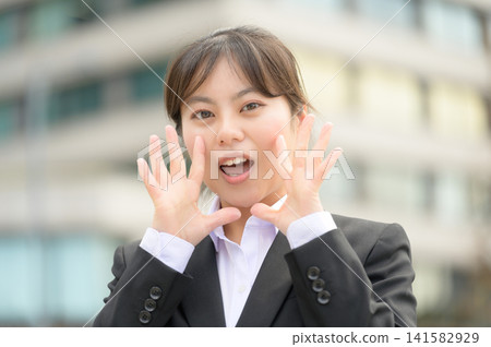 A Japanese woman in her 20s working for a company makes an appeal. A Japanese woman in her 20s working for a company makes an appeal. 141582929
