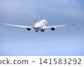 A Japan Airlines (JAL) Boeing 767 passenger plane taking off from Izumo Enmusubi Airport (with a blue sky background): Izumo City, Shimane Prefecture 141583292