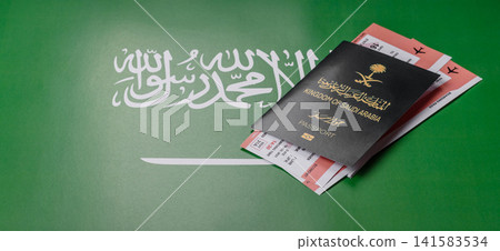 Saudi Arabia passport or id document with tickets for flight, travel. Saudi Arabia passport Saudi Arabia passport or id document with tickets for flight, travel. Saudi Arabia passport 141583534