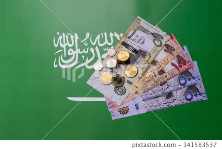 Saudi Arabia paper money, riyal banknotes and coins as currency for exchange. Saudi Arabia money 141583537