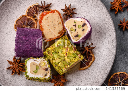 Turkish delight or lokum is a traditional Eastern sweet made with nuts. Turkish delight, lokum Turkish delight or lokum is a traditional Eastern sweet made with nuts. Turkish delight, lokum 141583569