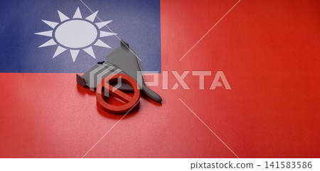 A Shahed drone featuring a prohibition symbol on the taiwanese flag as a conceptual background 141583586