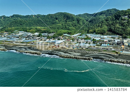 Aerial photographs capturing construction sites and residential areas along the coast of Shizuoka City. Aerial photographs capturing construction sites and residential areas along the coast of Shizuoka City. 141583784