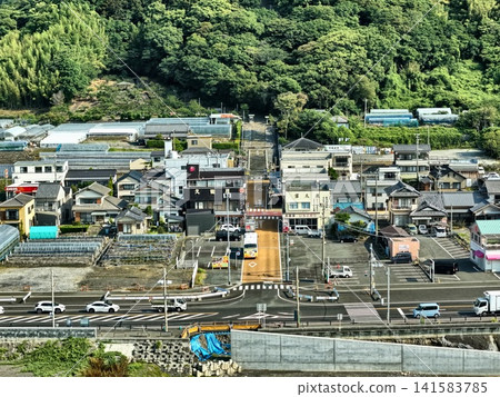 Aerial photograph capturing residential areas and hills in Shizuoka City. Aerial photograph capturing residential areas and hills in Shizuoka City. 141583785