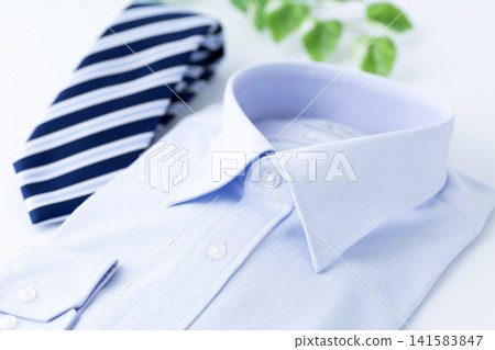 Blue regimental tie and dress shirt Blue regimental tie and dress shirt 141583847
