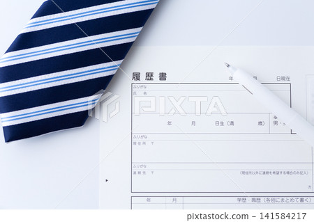 Resume and blue regimental tie Resume and blue regimental tie 141584217