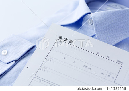 Resume and blue dress shirt 141584336