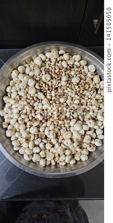 fried mushrooms in a plastic container 141585058