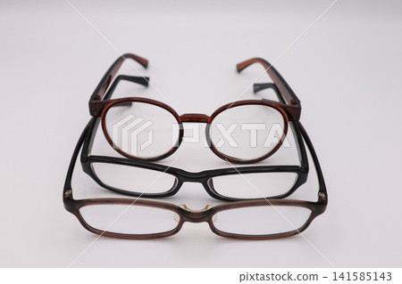 Close-ups of multiple pairs of glasses Close-ups of multiple pairs of glasses 141585143