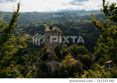 Katskhi Pillar in Georgia. The rock formation features a monastery at the top Katskhi Pillar in Georgia. The rock formation features a monastery at the top 141585346
