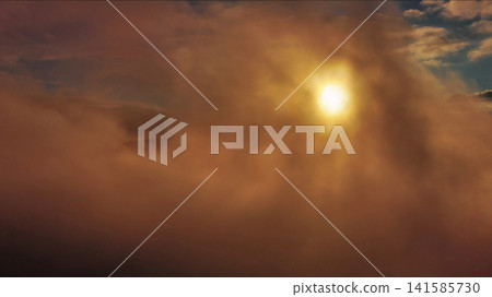 Aerial view of orange fluffy cloud in sky Aerial view of orange fluffy cloud in sky 141585730
