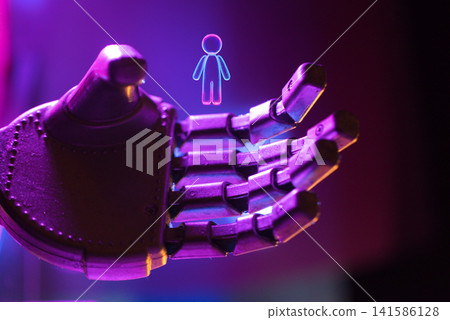 Robotic hand reaching towards a holographic human figure, illuminated with purple and blue lighting, showcasing advanced technology and innovation in robotics and artificial intelligence Robotic hand reaching towards a holographic human figure, illuminated with purple and blue lighting, showcasing advanced technology and innovation in robotics and artificial intelligence 141586128