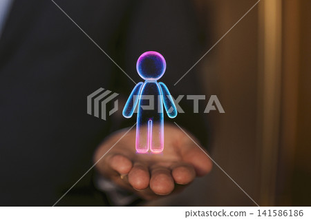 Digital hologram of a human figure displayed in a businessman's hand, showcasing advanced technology in a modern office environment with blurred background Digital hologram of a human figure displayed in a businessman's hand, showcasing advanced technology in a modern office environment with blurred background 141586186