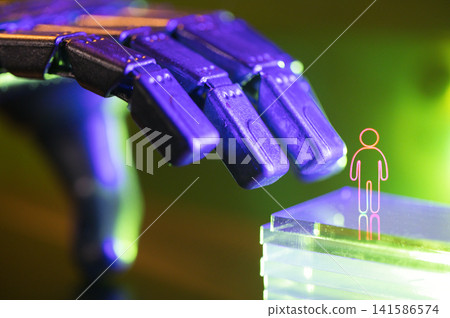 Robotic hand reaching towards a transparent block with a human figure outline, illuminated by colorful lights in a futuristic setting Robotic hand reaching towards a transparent block with a human figure outline, illuminated by colorful lights in a futuristic setting 141586574