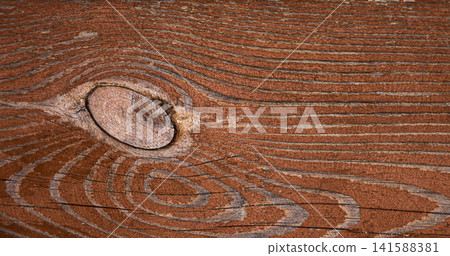 Close up of brown wood texture with natural knot and grain Close up of brown wood texture with natural knot and grain 141588381