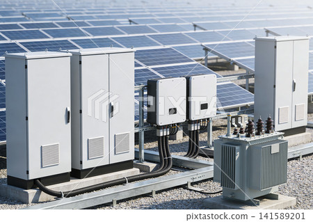 Modern solar farm with inverters and transformer for renewable energy generation Modern solar farm with inverters and transformer for renewable energy generation 141589201