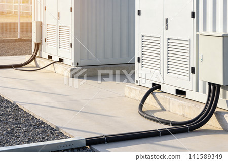Industrial power units with electrical conduits on concrete pad Industrial power units with electrical conduits on concrete pad 141589349