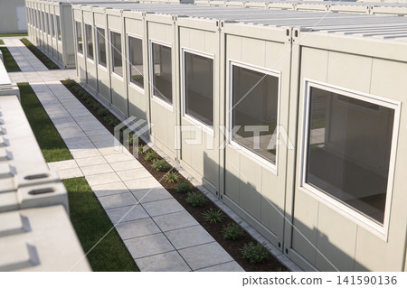 Row of modular portable buildings with windows and a walkway Row of modular portable buildings with windows and a walkway 141590136