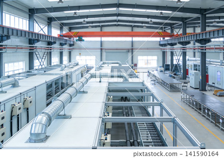 Modern industrial factory interior with ventilation systems and overhead crane Modern industrial factory interior with ventilation systems and overhead crane 141590164