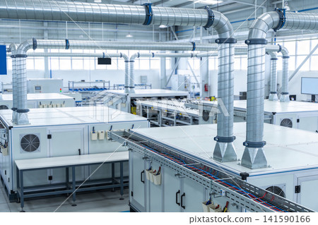 Modern factory interior with industrial ventilation systems and machinery Modern factory interior with industrial ventilation systems and machinery 141590166