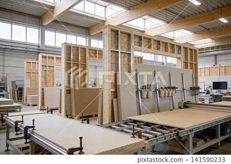 Modern construction workshop with timber framing and panel materials Modern construction workshop with timber framing and panel materials 141590233