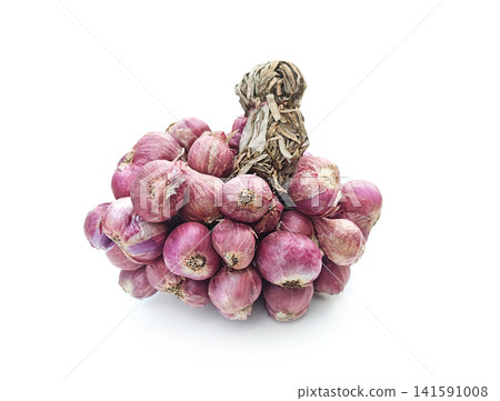 Fresh red shallots bundle, natural Thai kitchen herb, essential ingredient for healthy cooking and traditional Asian food on white background. Fresh red shallots bundle, natural Thai kitchen herb, essential ingredient for healthy cooking and traditional Asian food on white background. 141591008