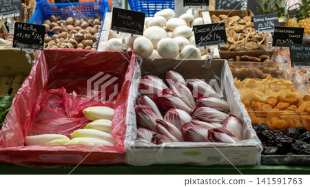 many red endive and belgian endive on the bucket of market in avignon, france 141591763