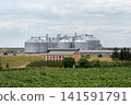 Modern Grain Storage Silos and Agricultural Complex in Rural Landscape. 141591791
