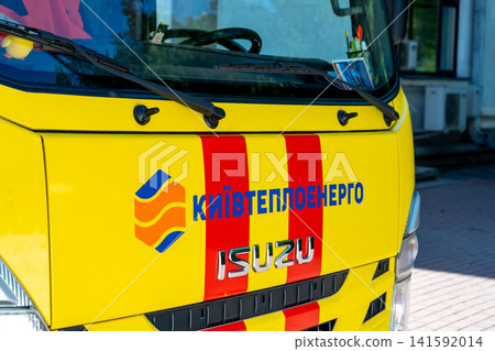 Kyivteploenergo Corporate Text Brand Logo On Yellow Isuzu Utility Service Truck Front Close Up Kyivteploenergo Corporate Text Brand Logo On Yellow Isuzu Utility Service Truck Front Close Up 141592014