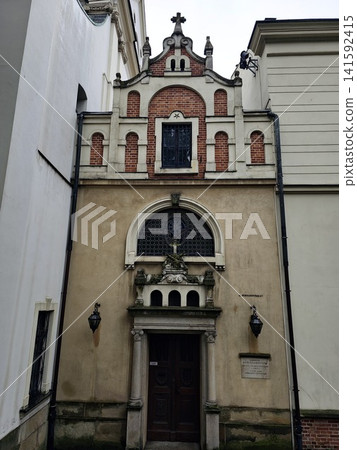Krakow, Poland - August 6, 2023: Entrance to Bernardine Monastery Krakow, Poland - August 6, 2023: Entrance to Bernardine Monastery 141592415