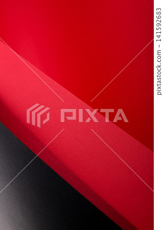 Abstract background of colored paper sheets on a black background Abstract background of colored paper sheets on a black background 141592683