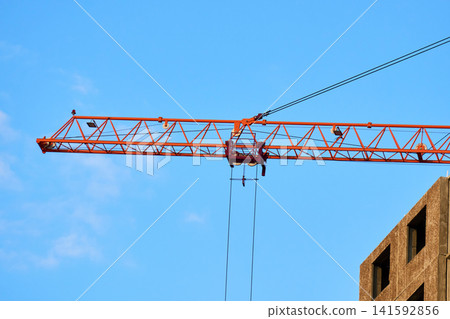 Modern tower crane assembly for high-rise building Modern tower crane assembly for high-rise building 141592856