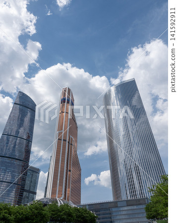 Modern high-rise buildings in Moscow city business district against the sky, urban architecture and contemporary cityscape Modern high-rise buildings in Moscow city business district against the sky, urban architecture and contemporary cityscape 141592911