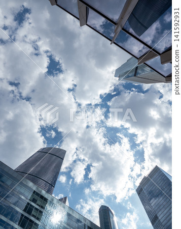 Modern high-rise buildings in Moscow city business district against the sky, urban architecture and contemporary cityscape Modern high-rise buildings in Moscow city business district against the sky, urban architecture and contemporary cityscape 141592931