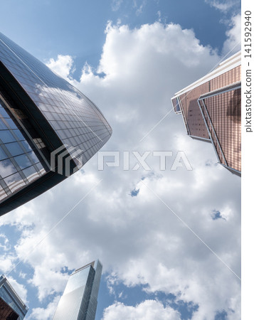 Modern high-rise buildings in Moscow city business district against the sky, urban architecture and contemporary cityscape Modern high-rise buildings in Moscow city business district against the sky, urban architecture and contemporary cityscape 141592940