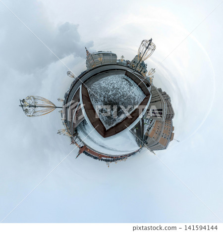 Russia Moscow 07 February 2026: Winter 360 panorama of Moscow Kremlin and Red Square transformed into a tiny planet effect. View from a bridge with snow covering iconic Russian architecture Russia Moscow 07 February 2026: Winter 360 panorama of Moscow Kremlin and Red Square transformed into a tiny planet effect. View from a bridge with snow covering iconic Russian architecture 141594144