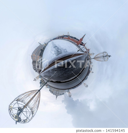Russia Moscow 07 February 2026: Winter 360 panorama of Moscow Kremlin and Red Square transformed into a tiny planet effect. View from a bridge with snow covering iconic Russian architecture 141594145