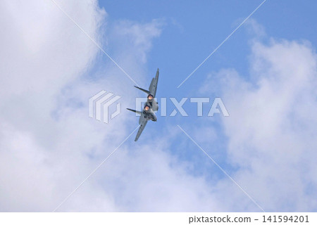 Russia Kubinka 12 April 2025. MiG-35 fighter jet performing aerobatics during an air show. Russian 4 plus plus generation multirole aircraft in flight with smoke trails Russia Kubinka 12 April 2025. MiG-35 fighter jet performing aerobatics during an air show. Russian 4 plus plus generation multirole aircraft in flight with smoke trails 141594201
