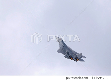 Russia Kubinka 12 April 2025. Su-57 fifth generation fighter jet performing aerobatics during an air show. Russian stealth aircraft in flight with smoke trails against blue sky Russia Kubinka 12 April 2025. Su-57 fifth generation fighter jet performing aerobatics during an air show. Russian stealth aircraft in flight with smoke trails against blue sky 141594209
