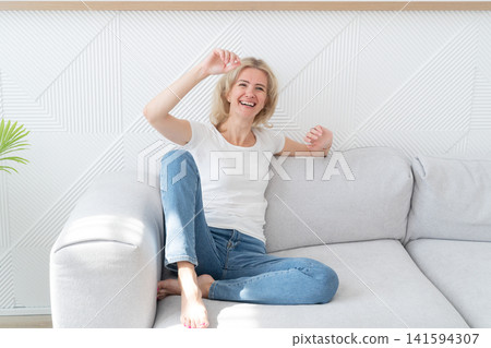 Lifestyle with happy 40s woman 141594307